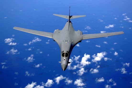 gray B-1B Lancer flying in the air